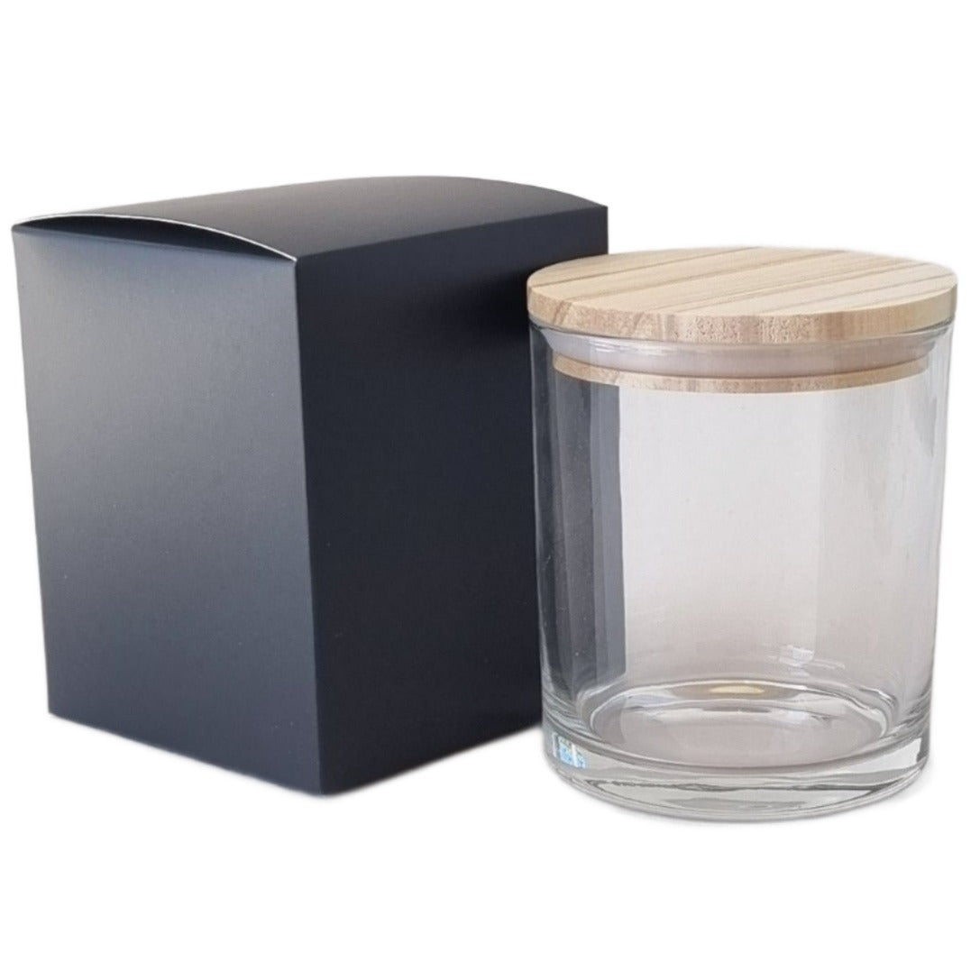 black cardboard box for a candle with matching container and lid for candle